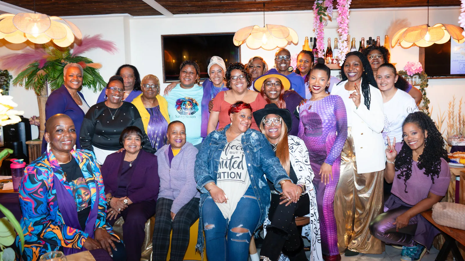 Members of the Savvy Sister community gathered together at a group event.
